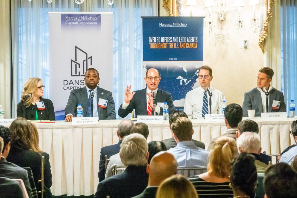 Adam Leitman Bailey speaking at a panel of real estate experts along with New York City council members to discuss the anticipated rent regulation reform